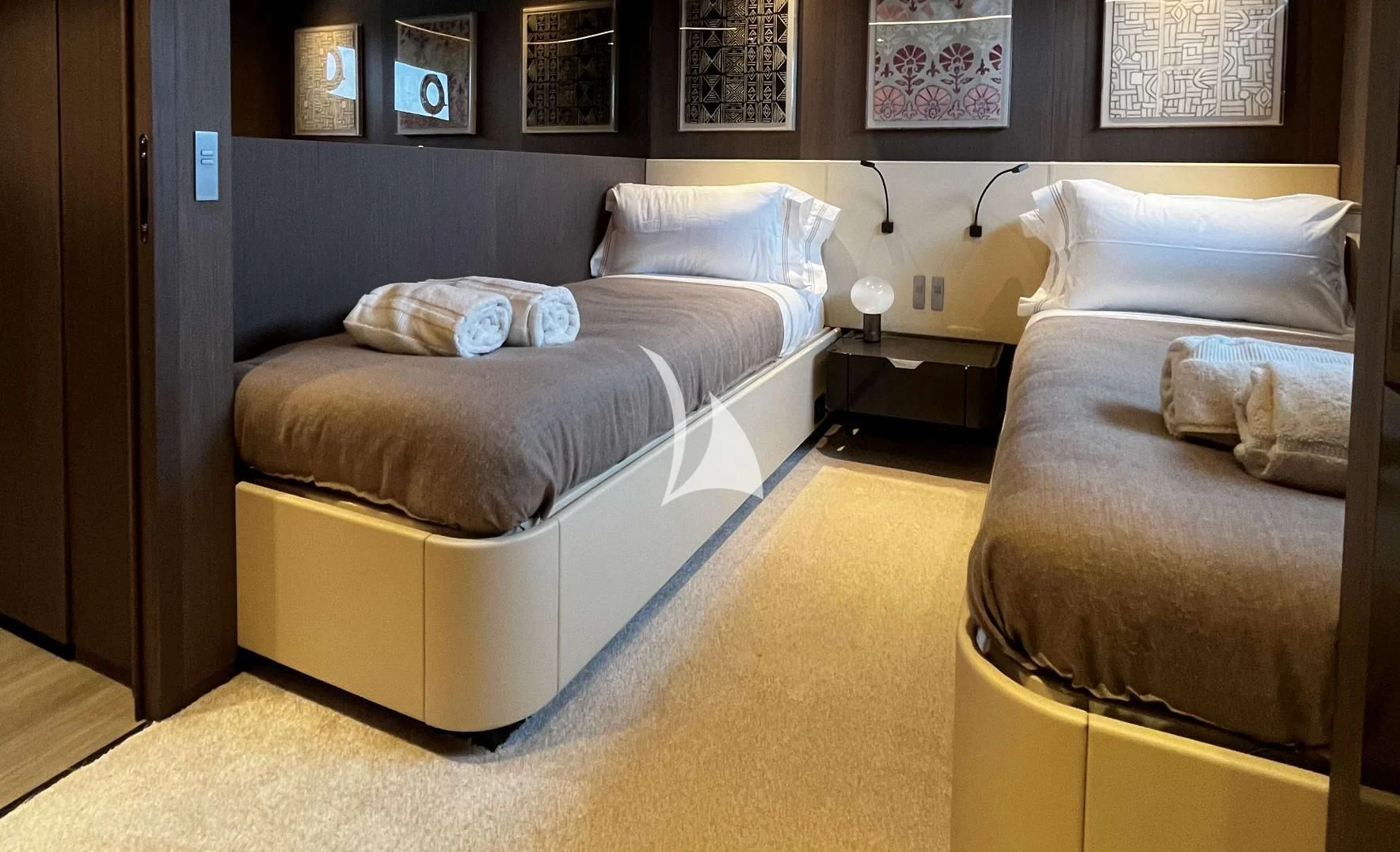 a couple of beds in a room aboard ALVIUM Yacht for Sale