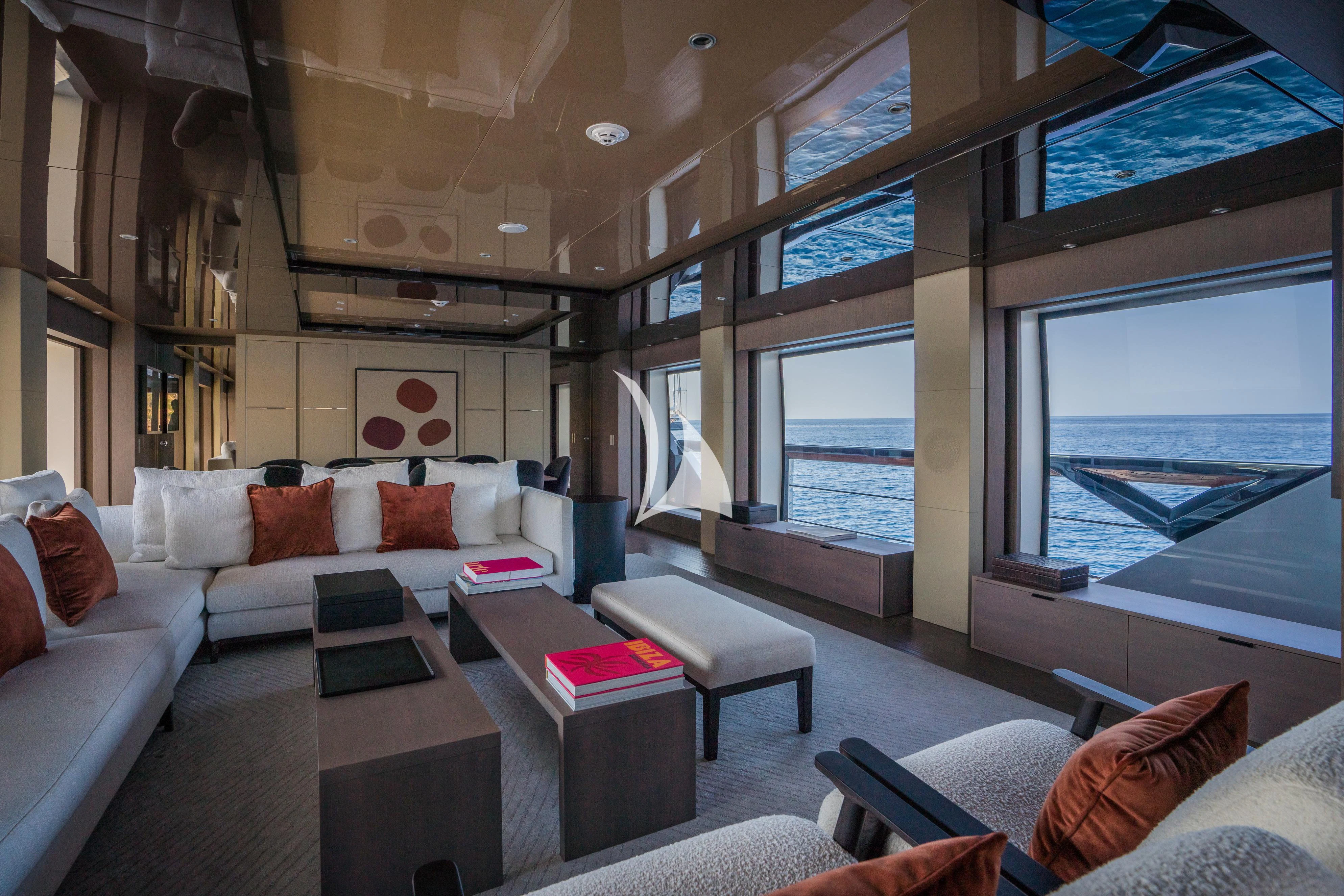 a living room with a large window aboard ALVIUM Yacht for Sale