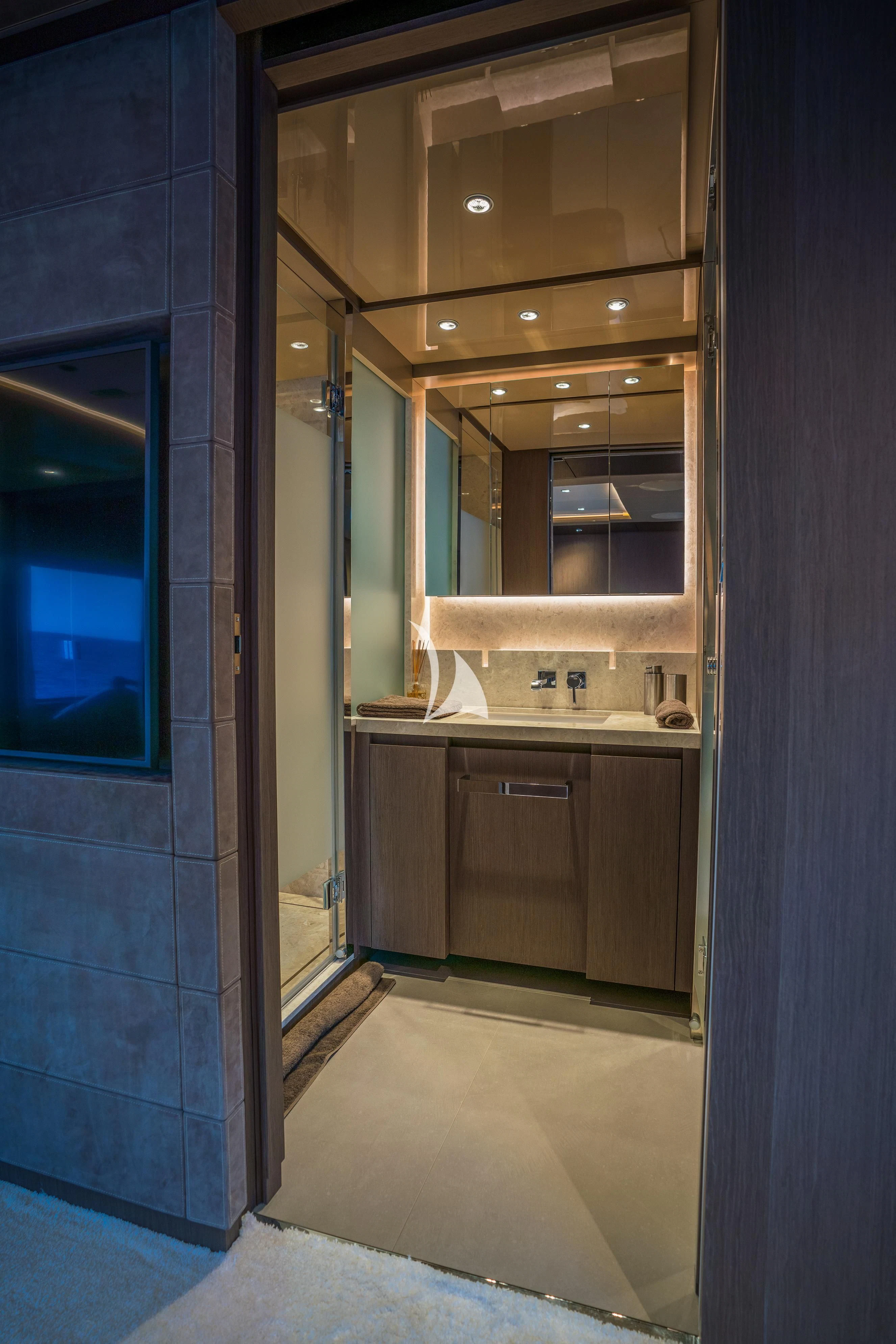 a bathroom with a sink and a mirror aboard ALVIUM Yacht for Sale