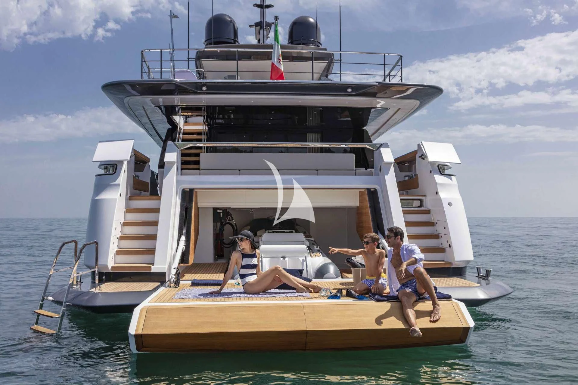 a group of people on a boat aboard ALVIUM Yacht for Sale