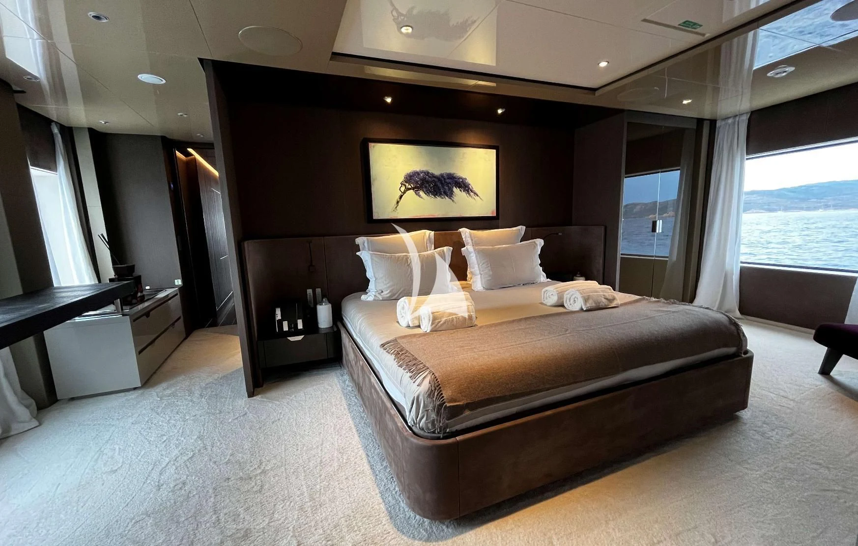 a bed in a room aboard ALVIUM Yacht for Sale