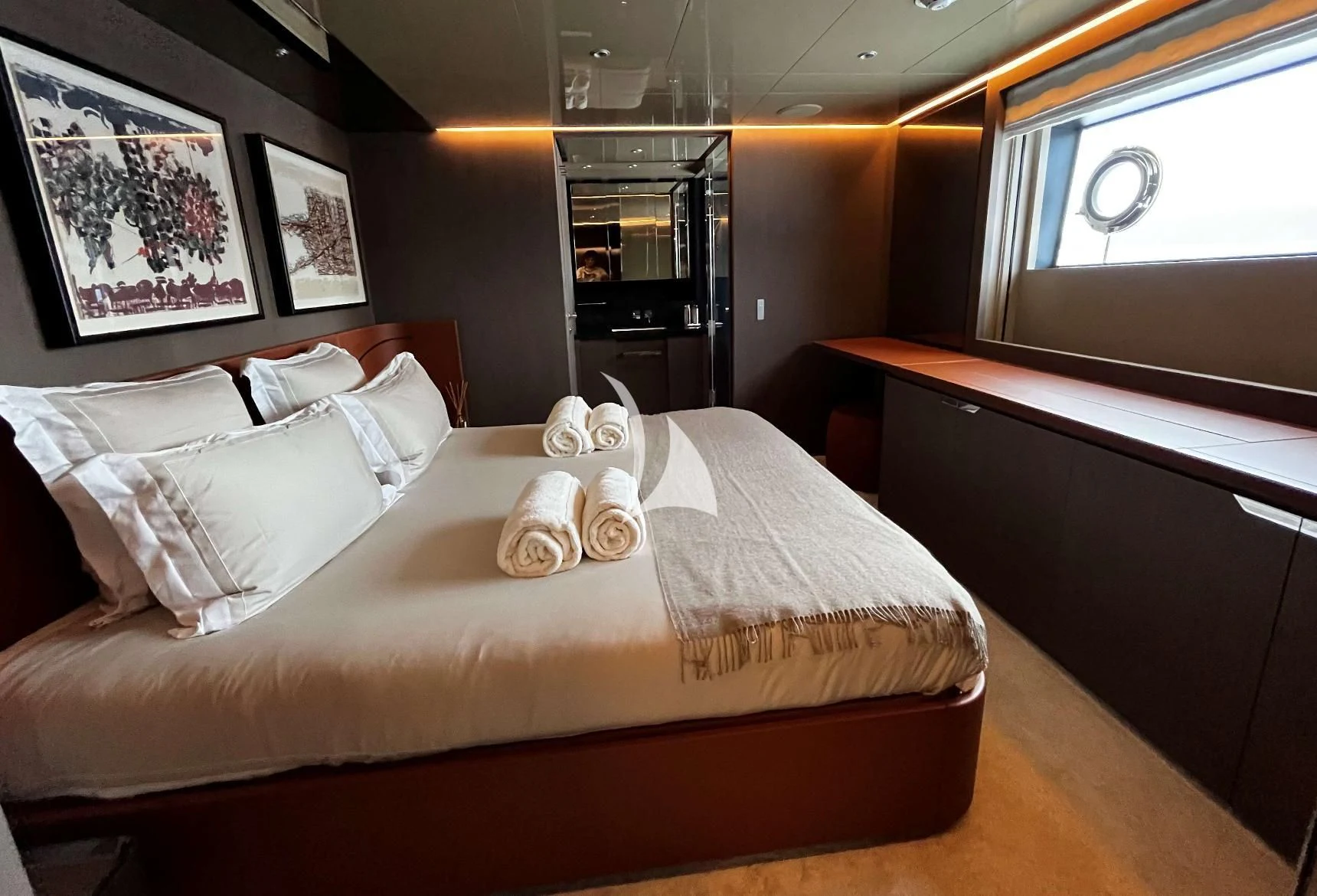 a bed with white sheets aboard ALVIUM Yacht for Sale