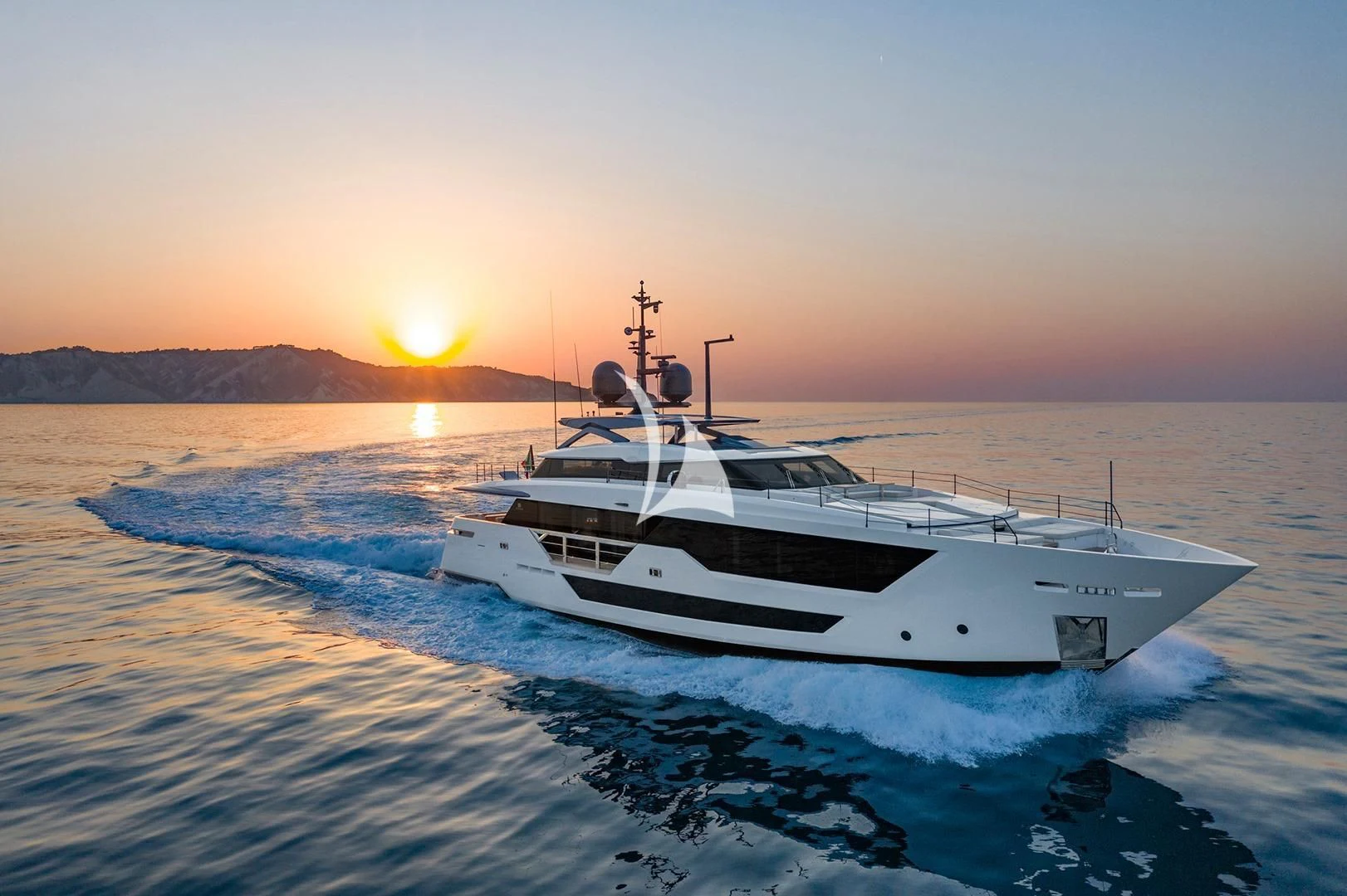 a white boat on the water aboard ALVIUM Yacht for Sale