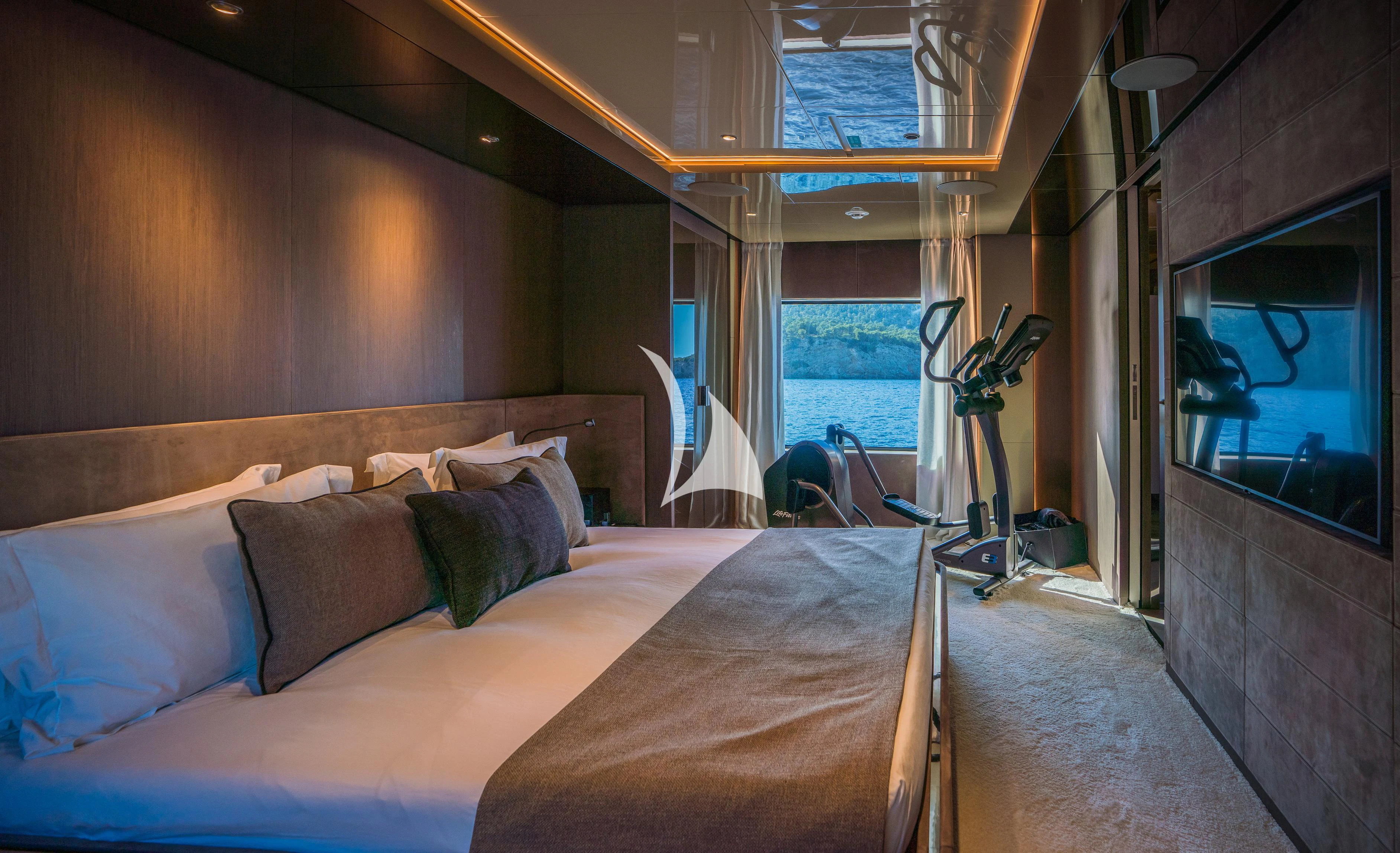 a bed in a room aboard ALVIUM Yacht for Sale