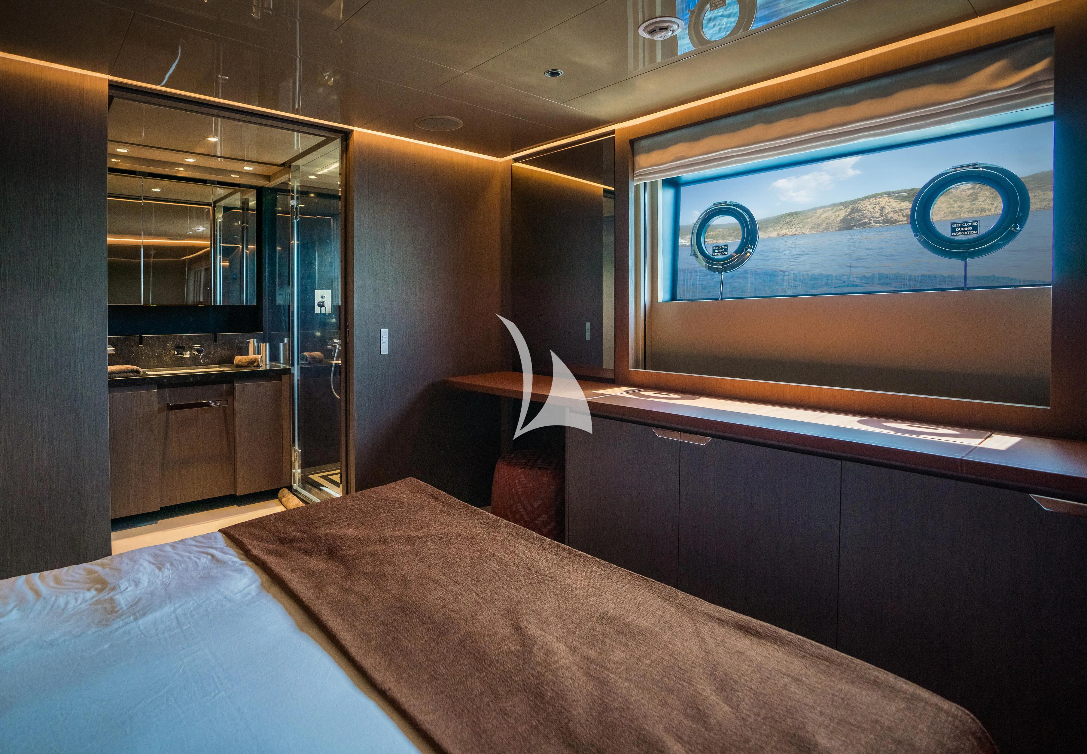 a table with a screen on it aboard ALVIUM Yacht for Sale