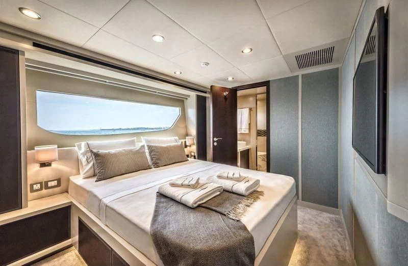 a bed in a room aboard DOLCE VITA Yacht for Sale