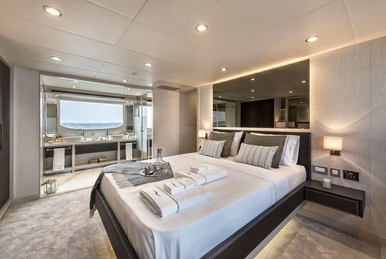 a hotel room with a bed aboard DOLCE VITA Yacht for Sale