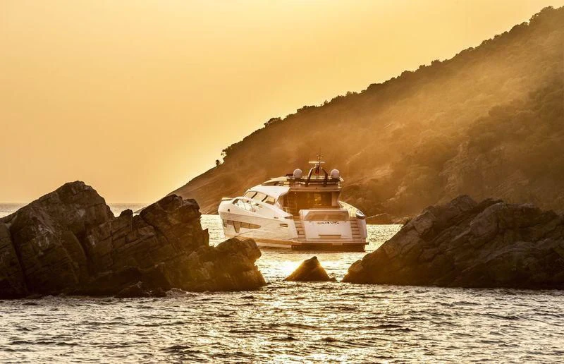 a boat on a body of water aboard DOLCE VITA Yacht for Sale