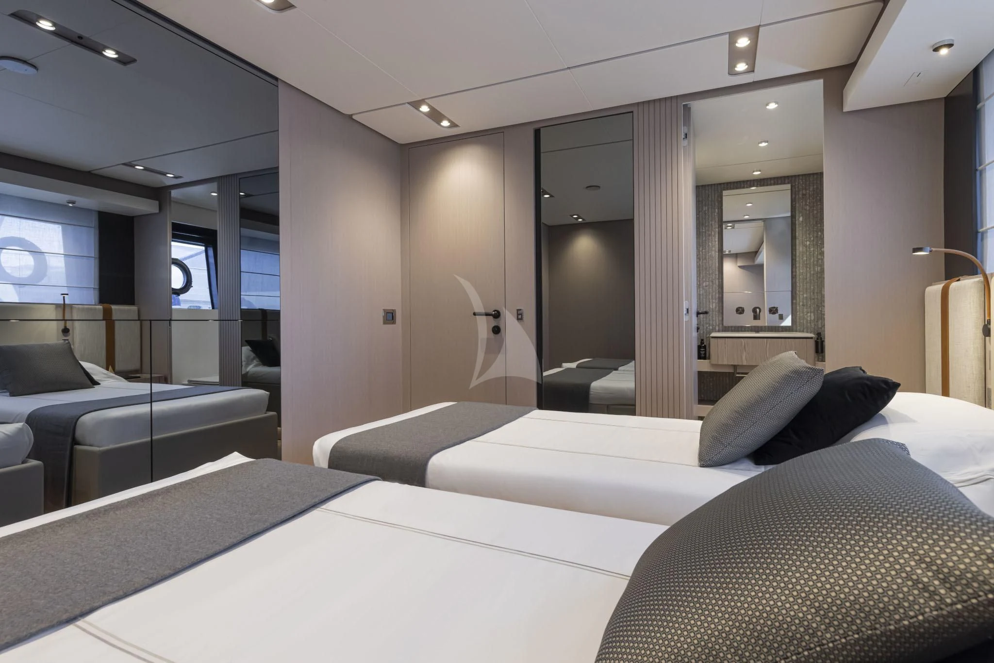 a room with a bed and a couch aboard H&CO Yacht for Sale