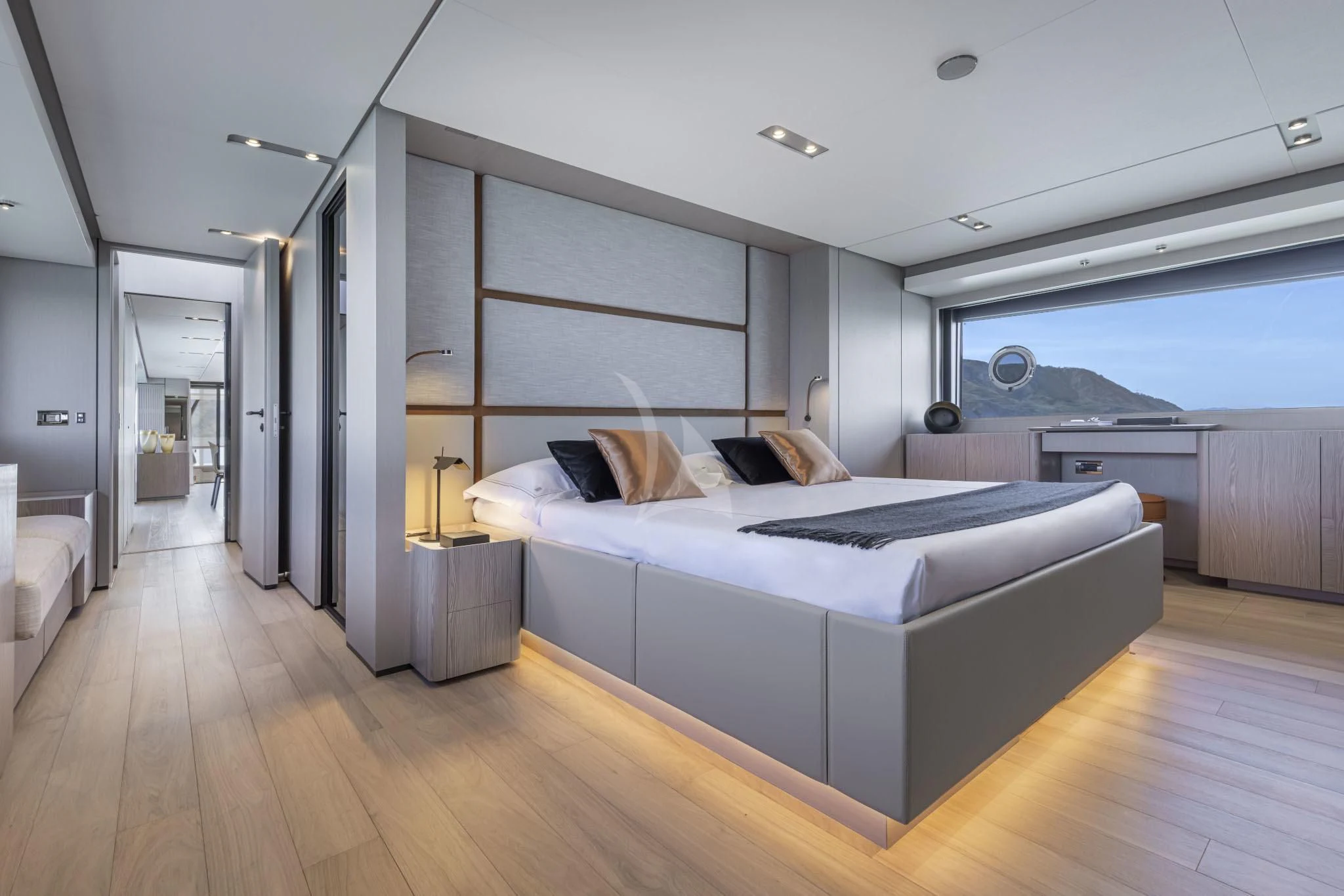 a bedroom with a large bed aboard H&CO Yacht for Sale