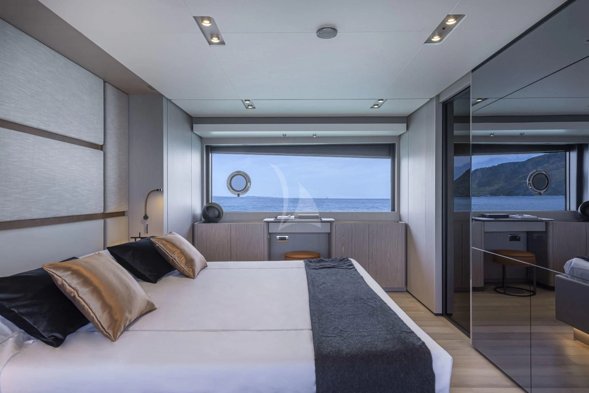 a large bedroom with a large bed aboard H&CO Yacht for Sale