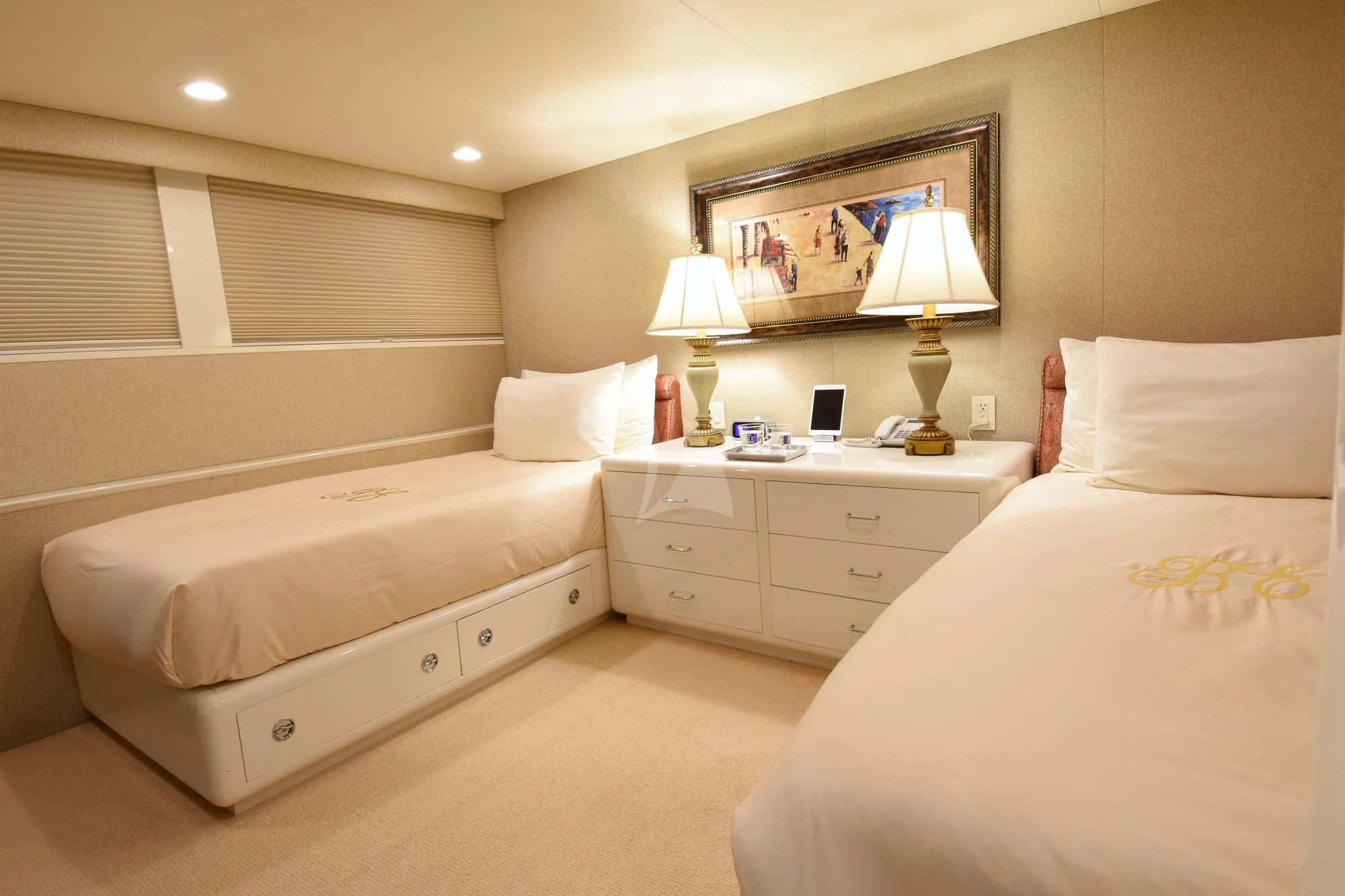 a bedroom with two beds aboard BIG EAGLE Yacht for Sale