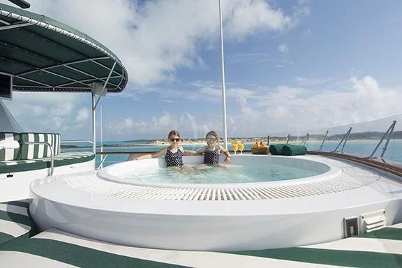 a group of people in a pool aboard BIG EAGLE Yacht for Sale