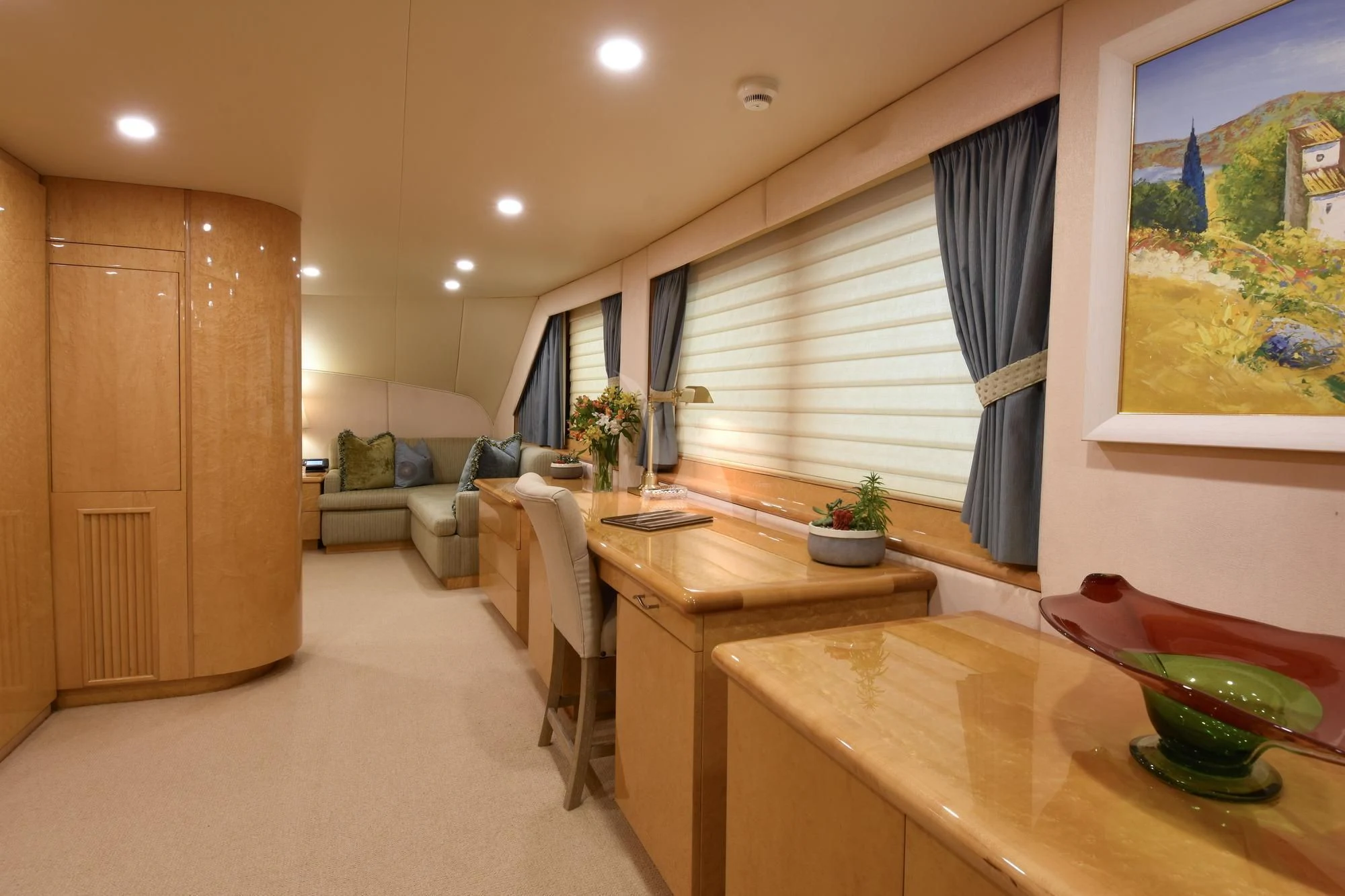a living room with a table and chairs aboard BIG EAGLE Yacht for Sale