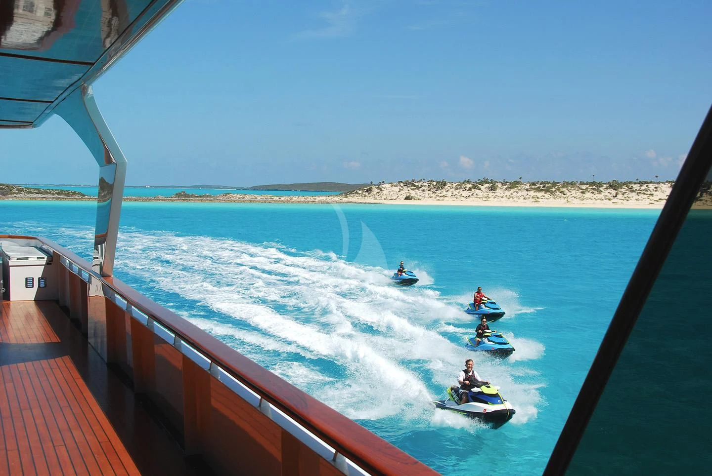 people on jet skis in the water aboard BIG EAGLE Yacht for Sale