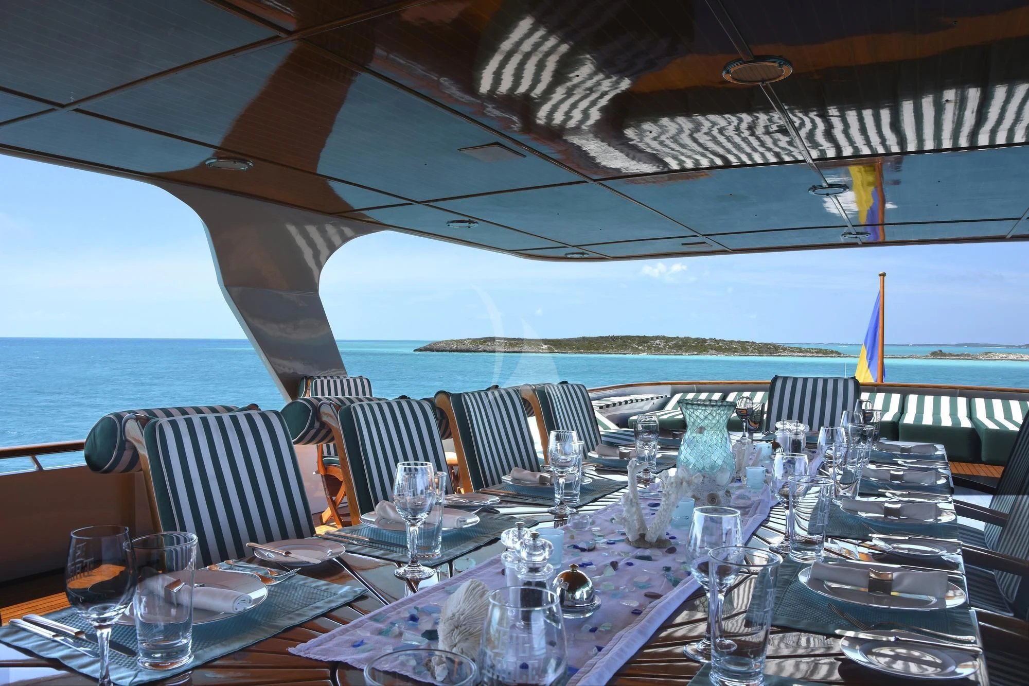 a table set for a dinner aboard BIG EAGLE Yacht for Sale