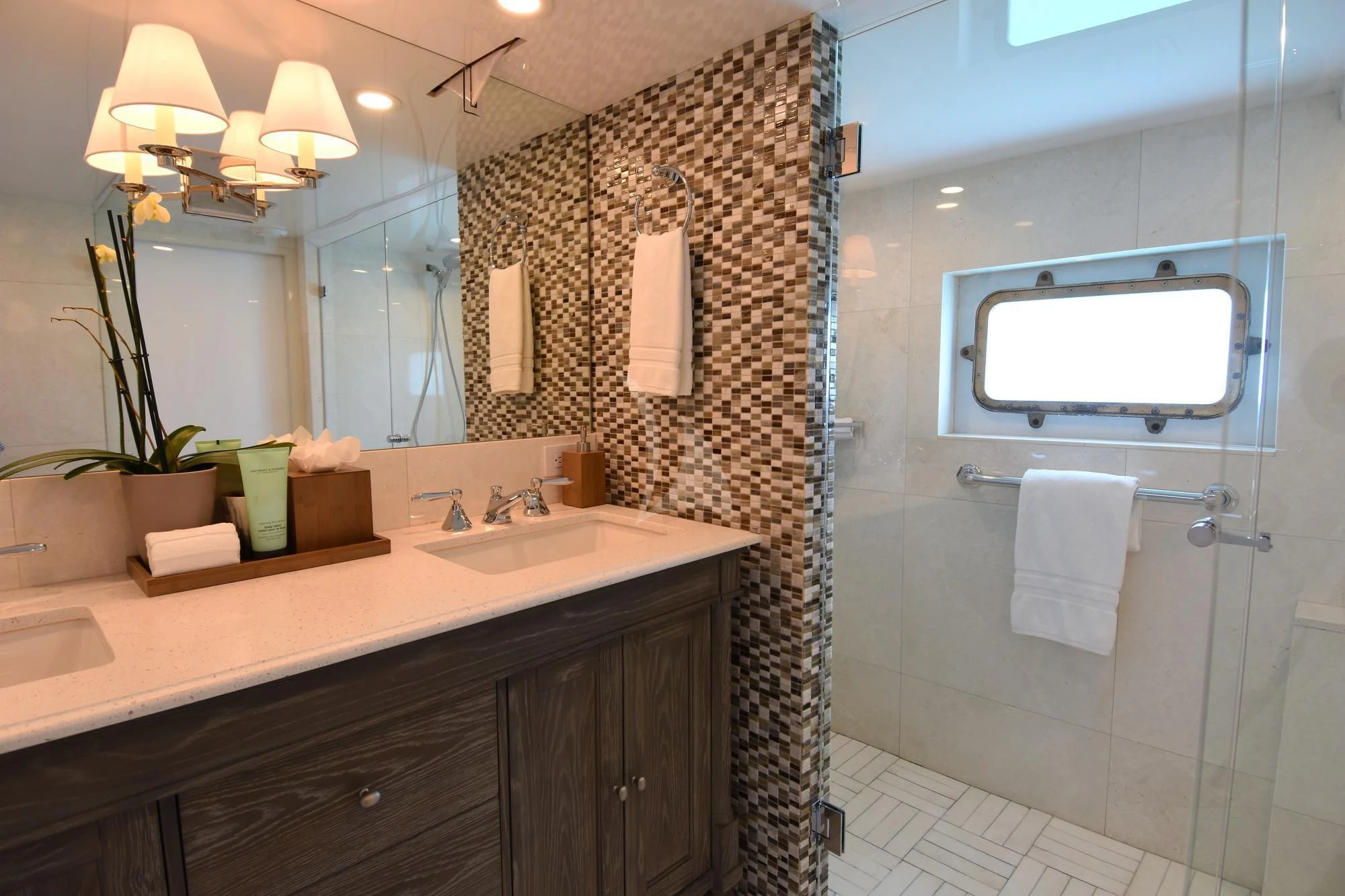 a bathroom with a sink and a mirror aboard BIG EAGLE Yacht for Sale
