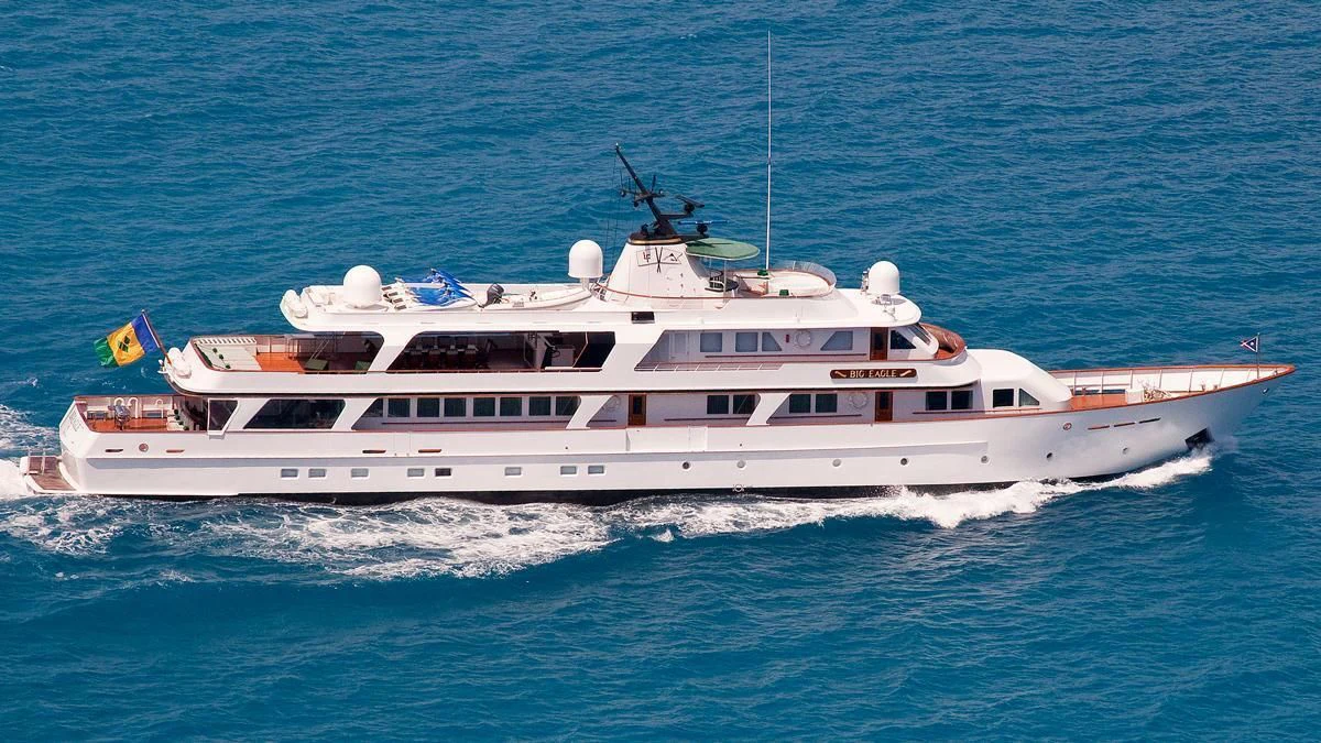 a white yacht on the water aboard BIG EAGLE Yacht for Sale