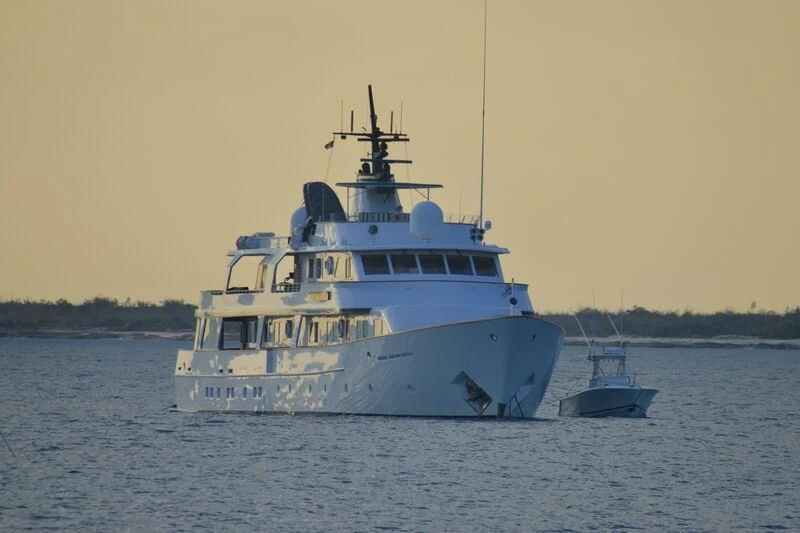 a large white boat on the water aboard BIG EAGLE Yacht for Sale