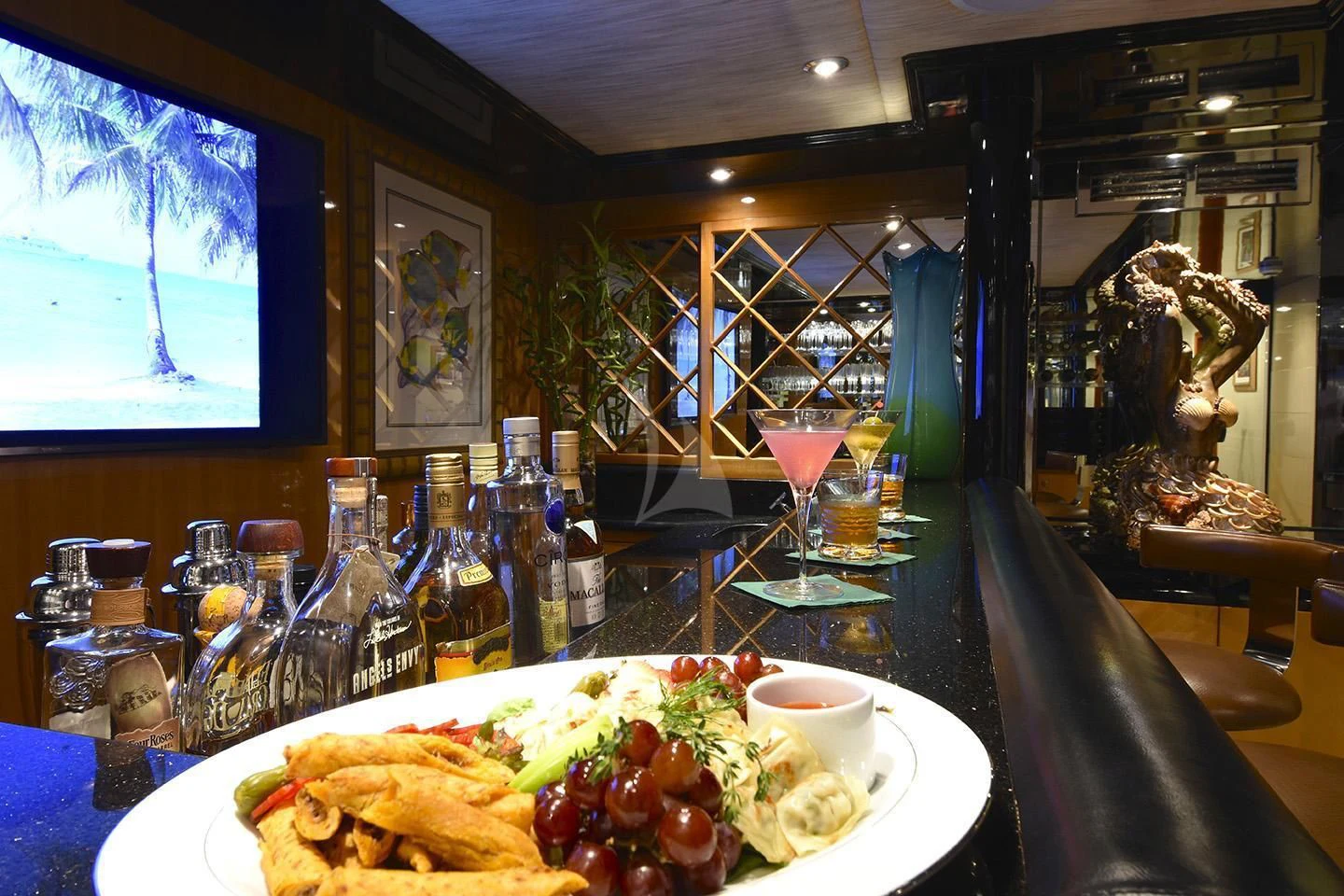 a table with food and drinks aboard BIG EAGLE Yacht for Sale