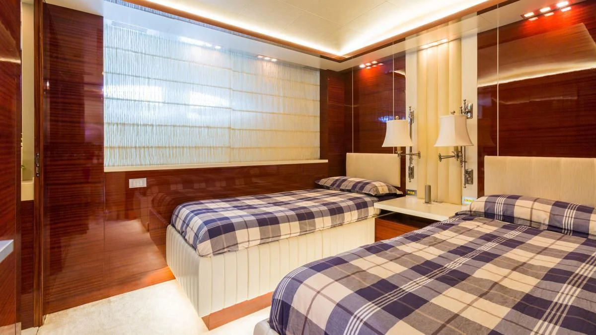 a room with two beds aboard BLUE DEVIL Yacht for Sale