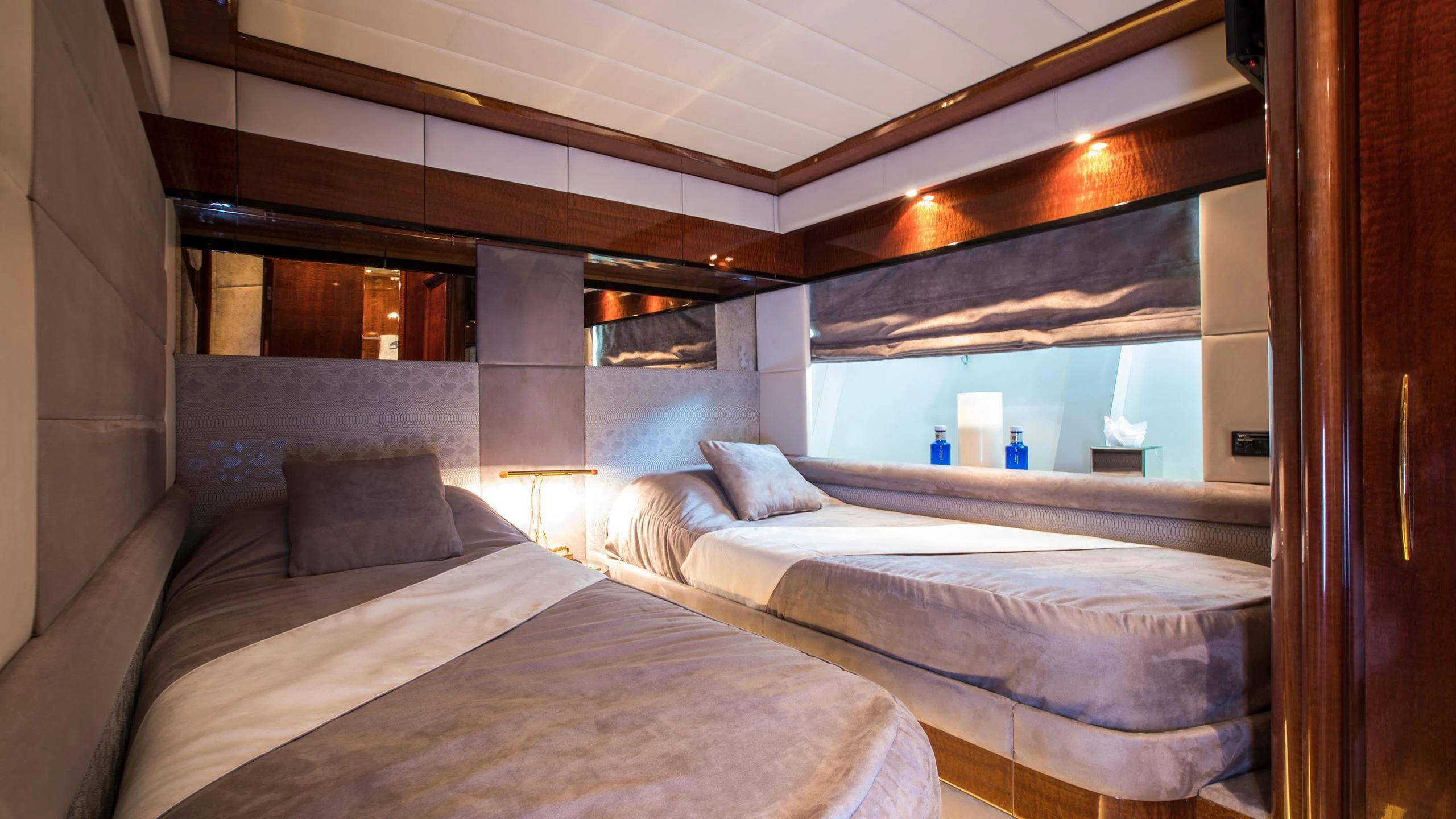 a room with two beds aboard SERAPH PRIMERO Yacht for Sale