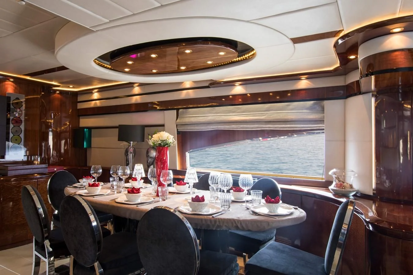 a dining room with a table and chairs aboard SERAPH PRIMERO Yacht for Sale