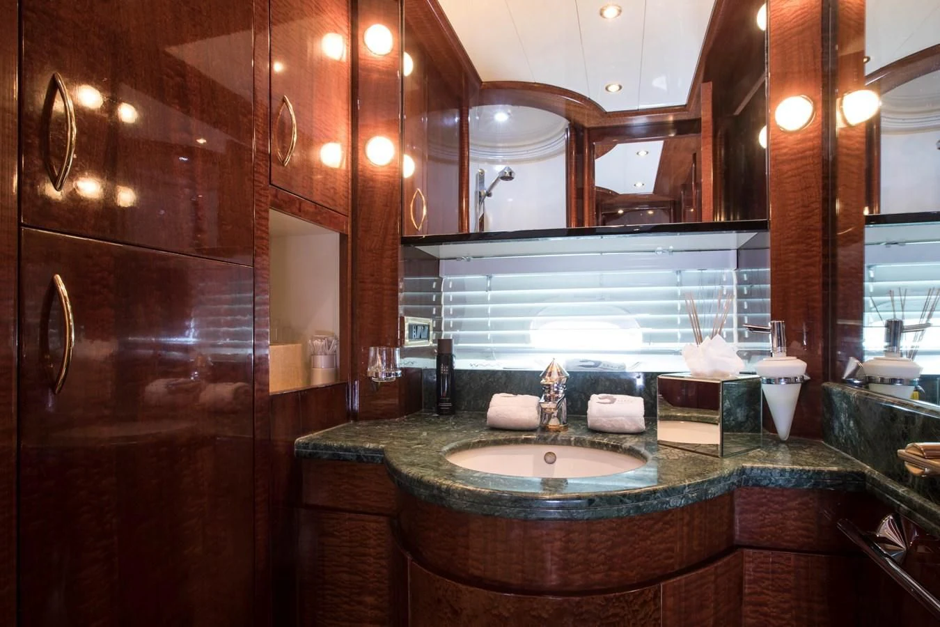 a bathroom with a large mirror aboard SERAPH PRIMERO Yacht for Sale