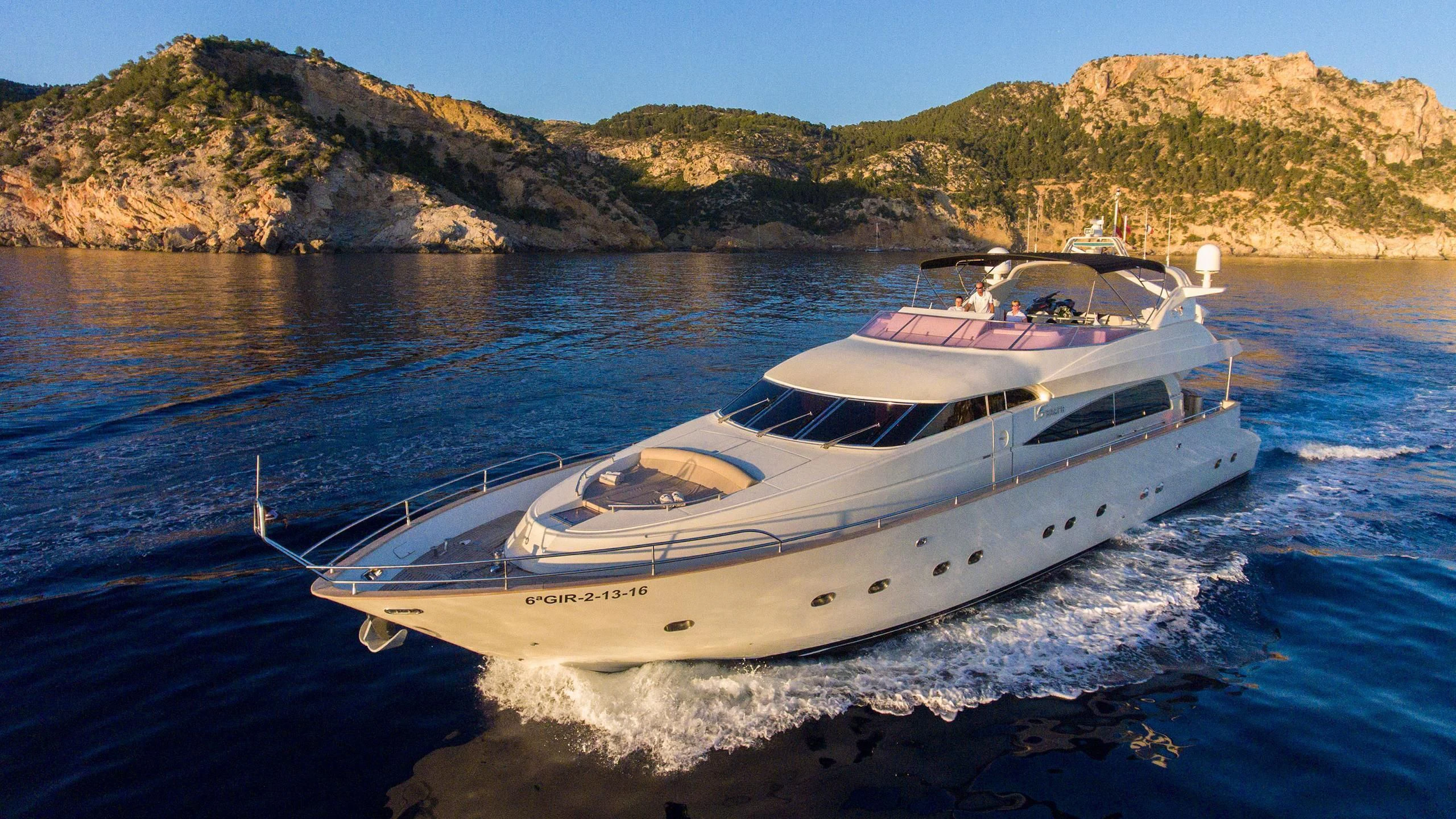 a white yacht on the water aboard SERAPH PRIMERO Yacht for Sale