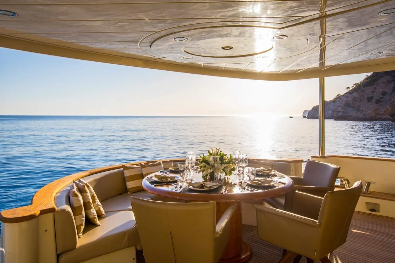 a room with a table and chairs aboard SERAPH PRIMERO Yacht for Sale