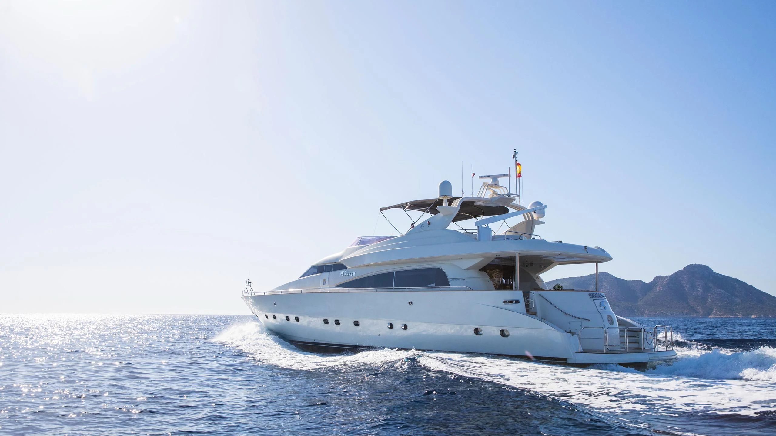 a white yacht on the water aboard SERAPH PRIMERO Yacht for Sale