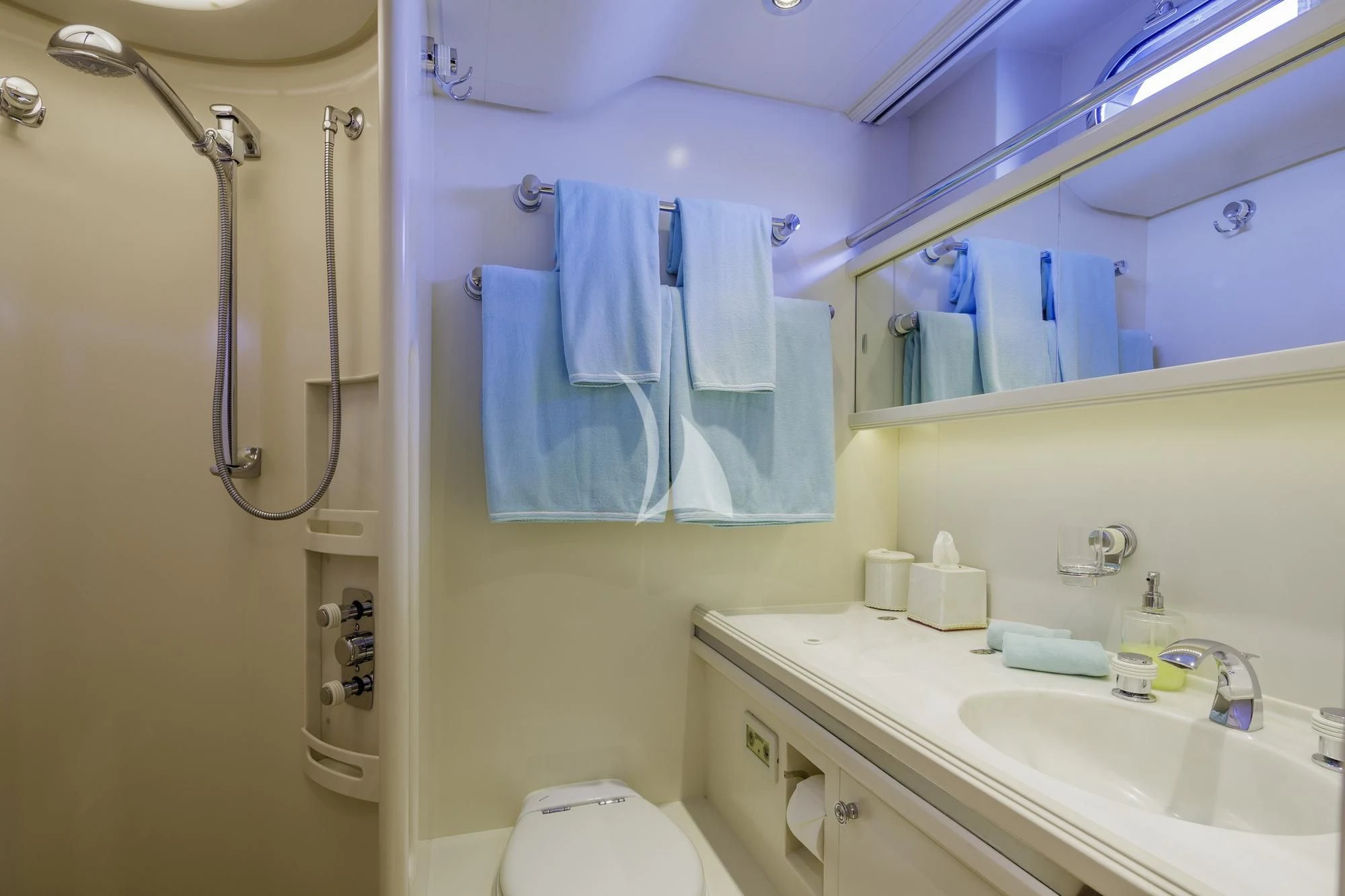 a bathroom with a sink and a toilet aboard NOMMO Yacht for Sale