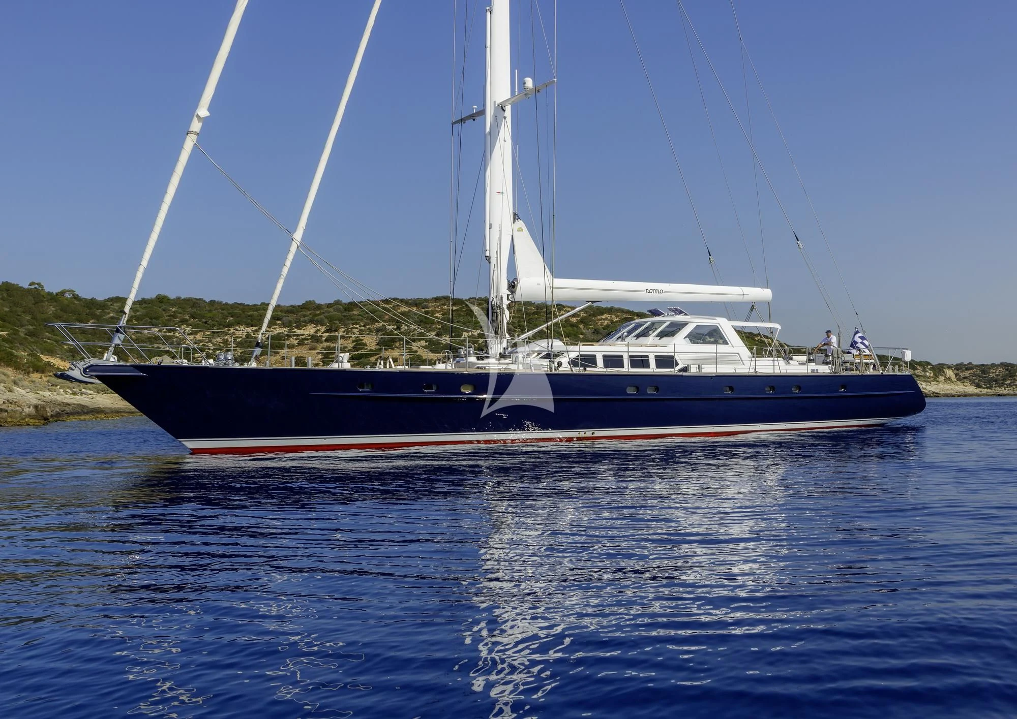 a boat on the water aboard NOMMO Yacht for Sale