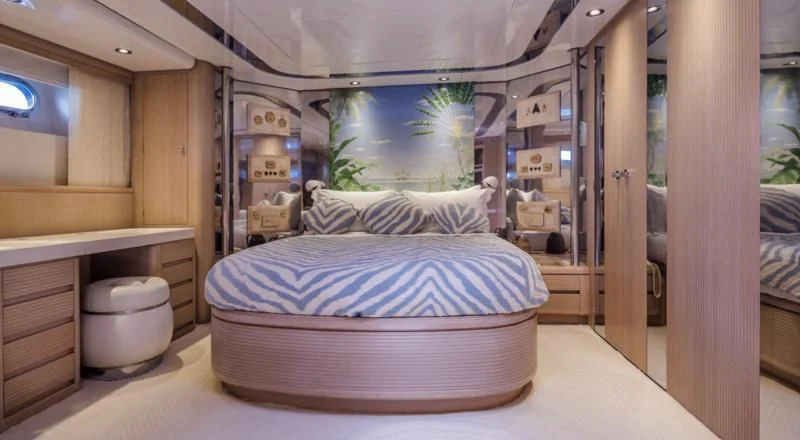 a bed in a room aboard NOMMO Yacht for Sale