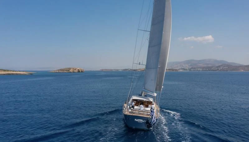 a sailboat on the water aboard NOMMO Yacht for Sale