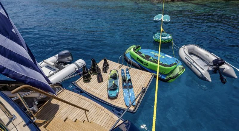 a boat with a rope attached to it aboard NOMMO Yacht for Sale