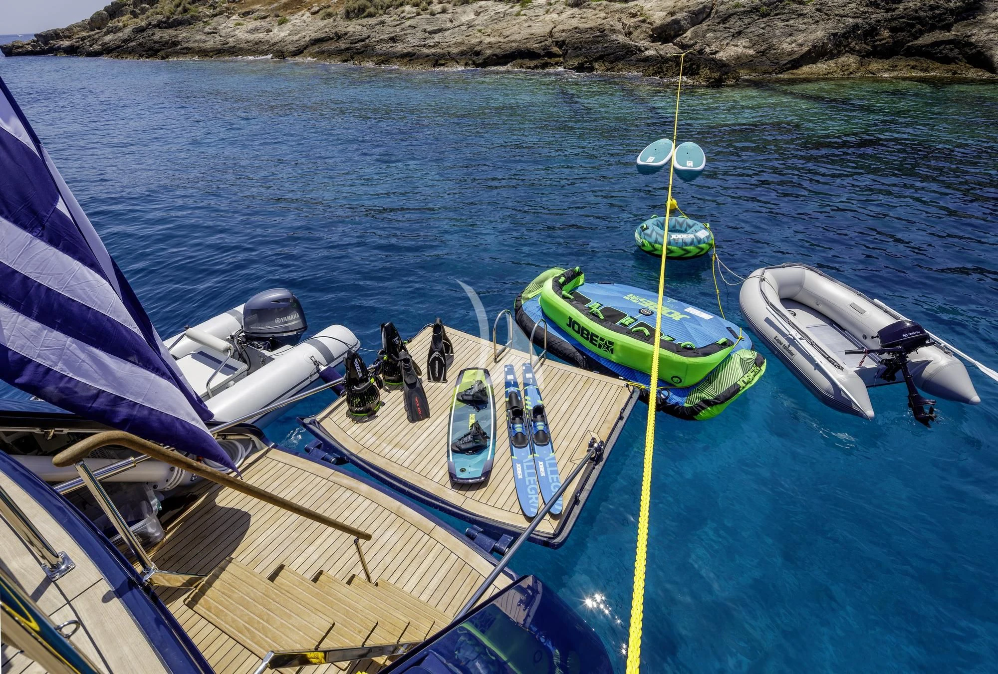 a boat with a rope attached to it aboard NOMMO Yacht for Sale