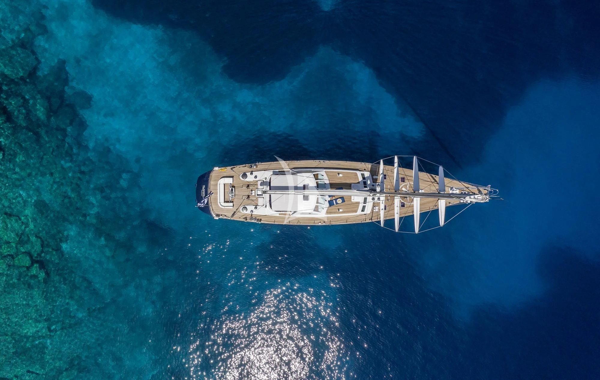 a satellite in space aboard NOMMO Yacht for Sale