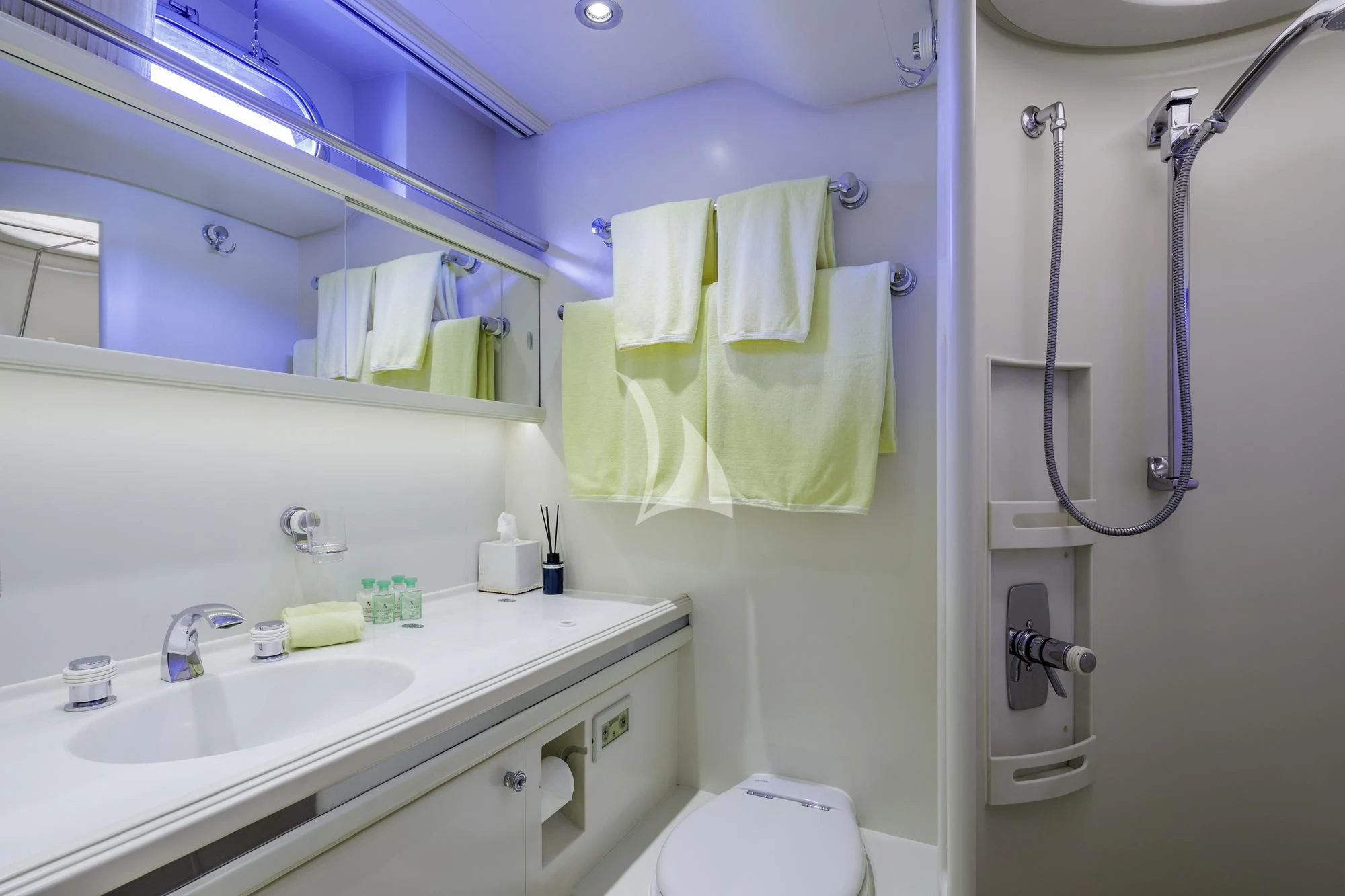 a bathroom with a sink and a shower aboard NOMMO Yacht for Sale
