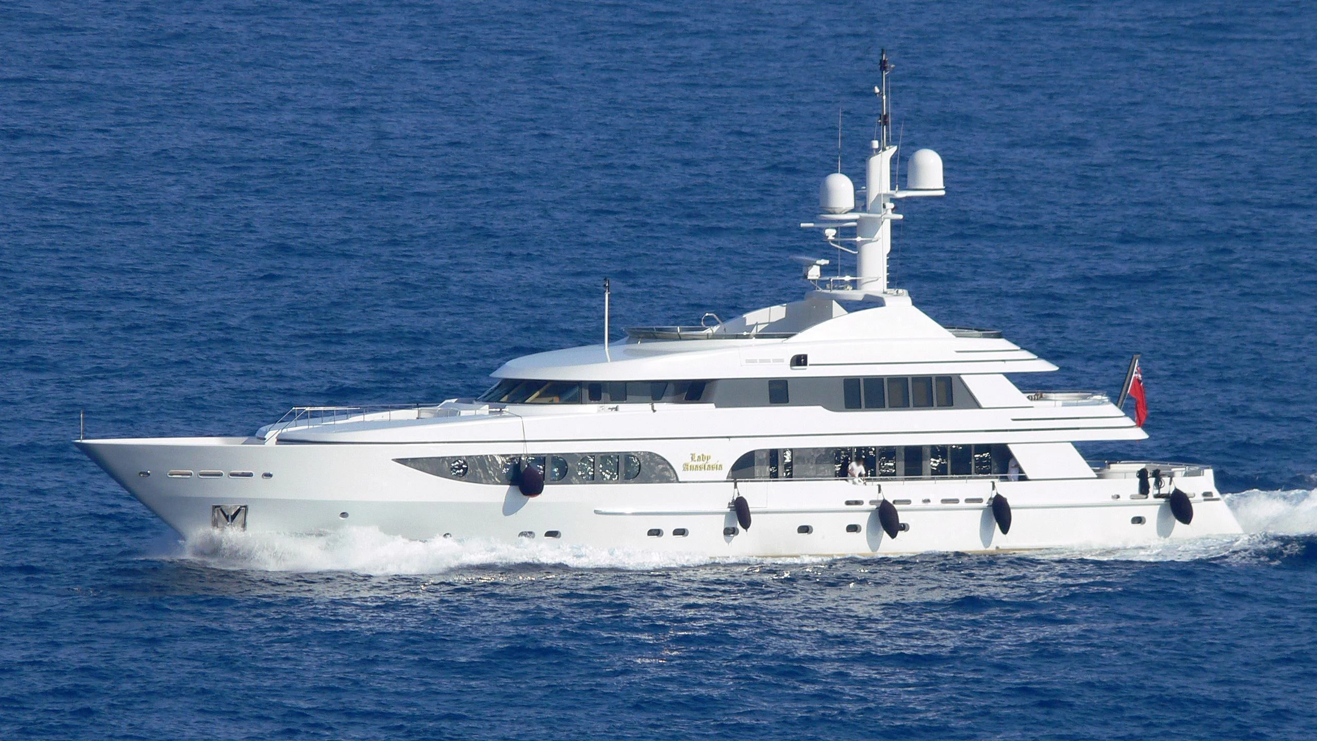 a white yacht in the water aboard VITA NOVA Yacht for Sale