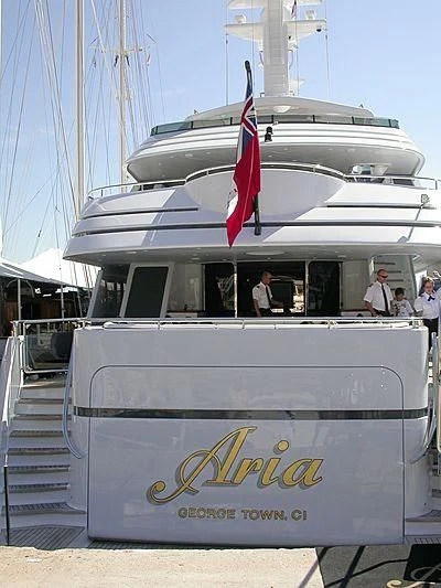 a boat with a flag on the front aboard VITA NOVA Yacht for Sale