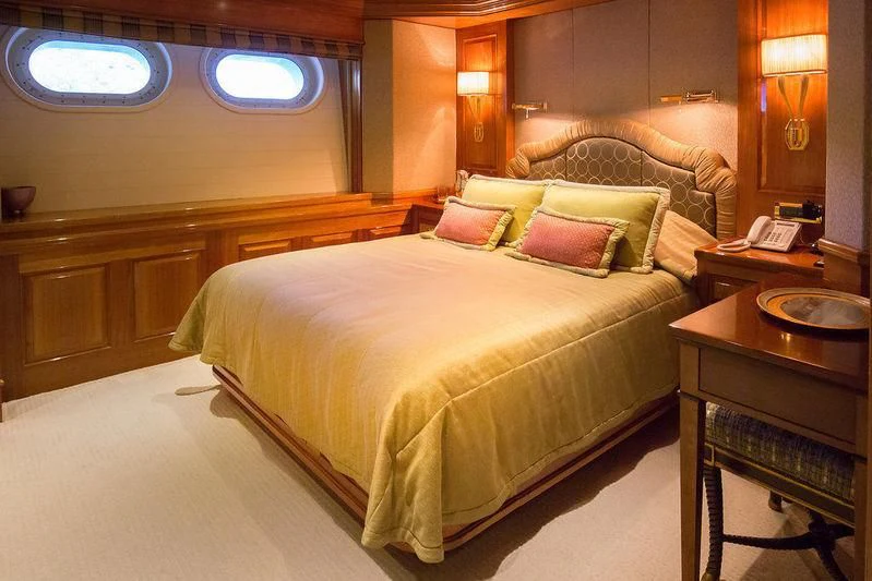 a bed in a hotel room aboard VITA NOVA Yacht for Sale