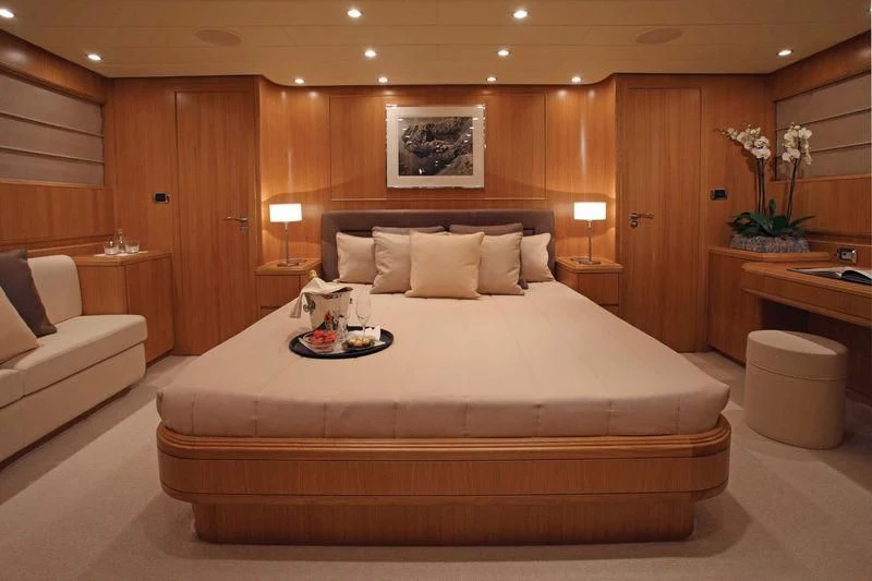 a bed in a hotel room aboard SERALIN Yacht for Sale