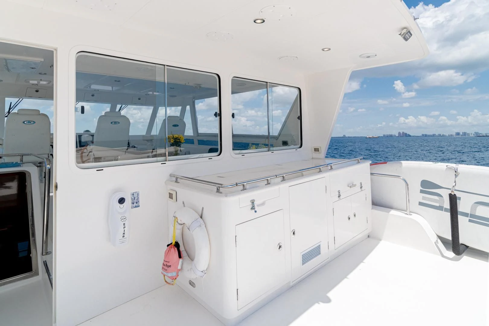a white boat with windows aboard DREAM CATCHER Yacht for Sale