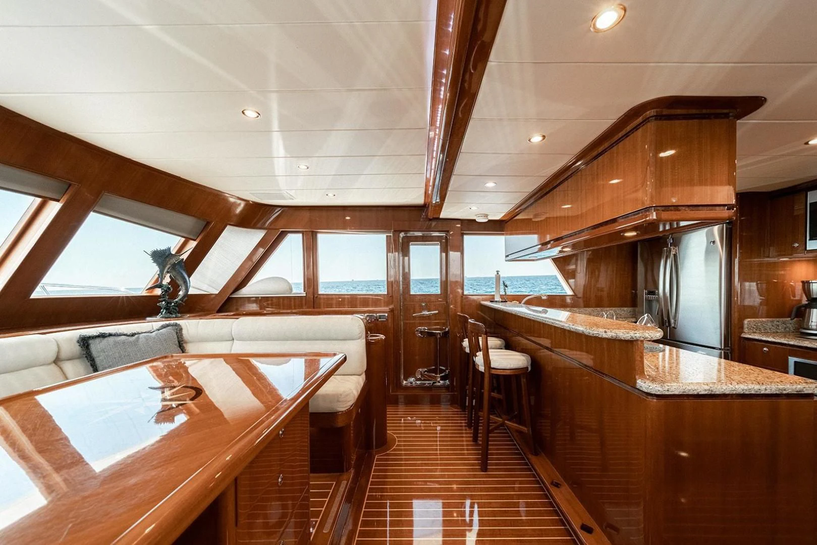 a room with wood floors and wood walls aboard DREAM CATCHER Yacht for Sale