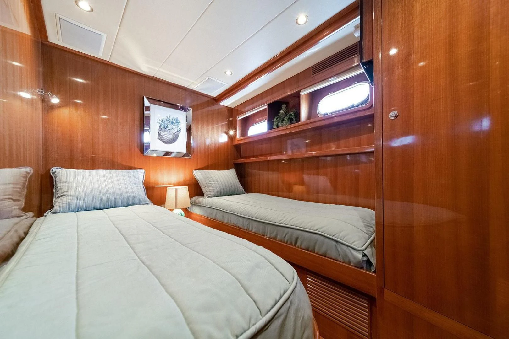 a room with two beds aboard DREAM CATCHER Yacht for Sale