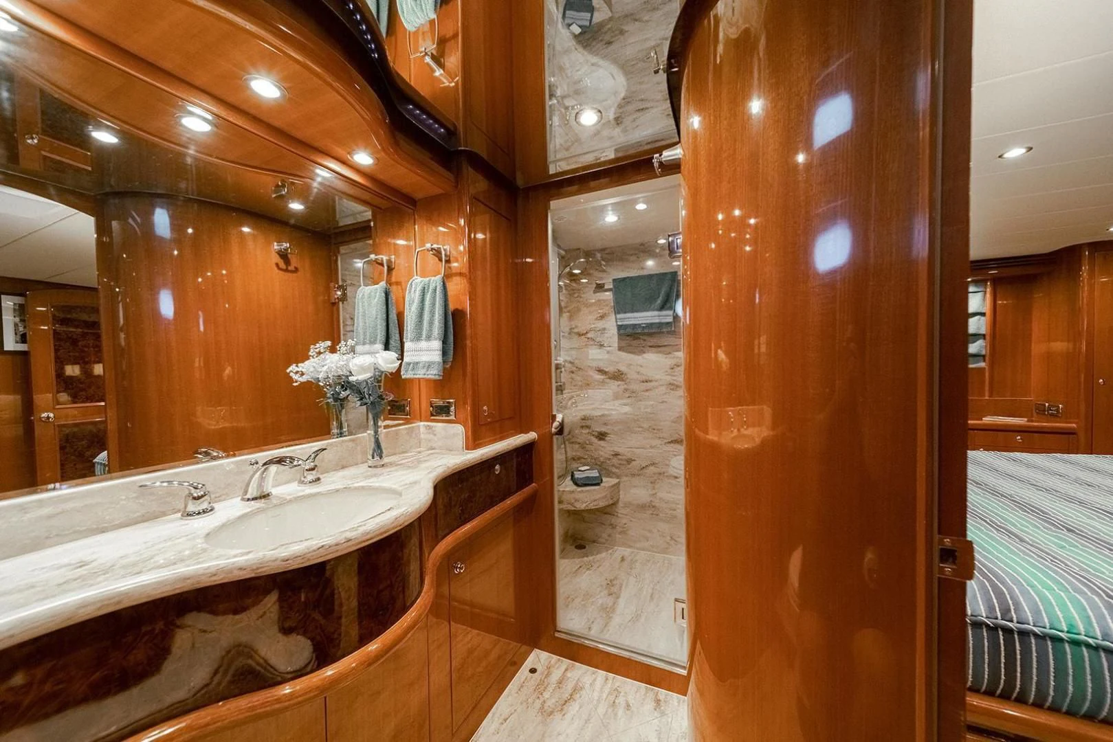 a bathroom with a large mirror aboard DREAM CATCHER Yacht for Sale
