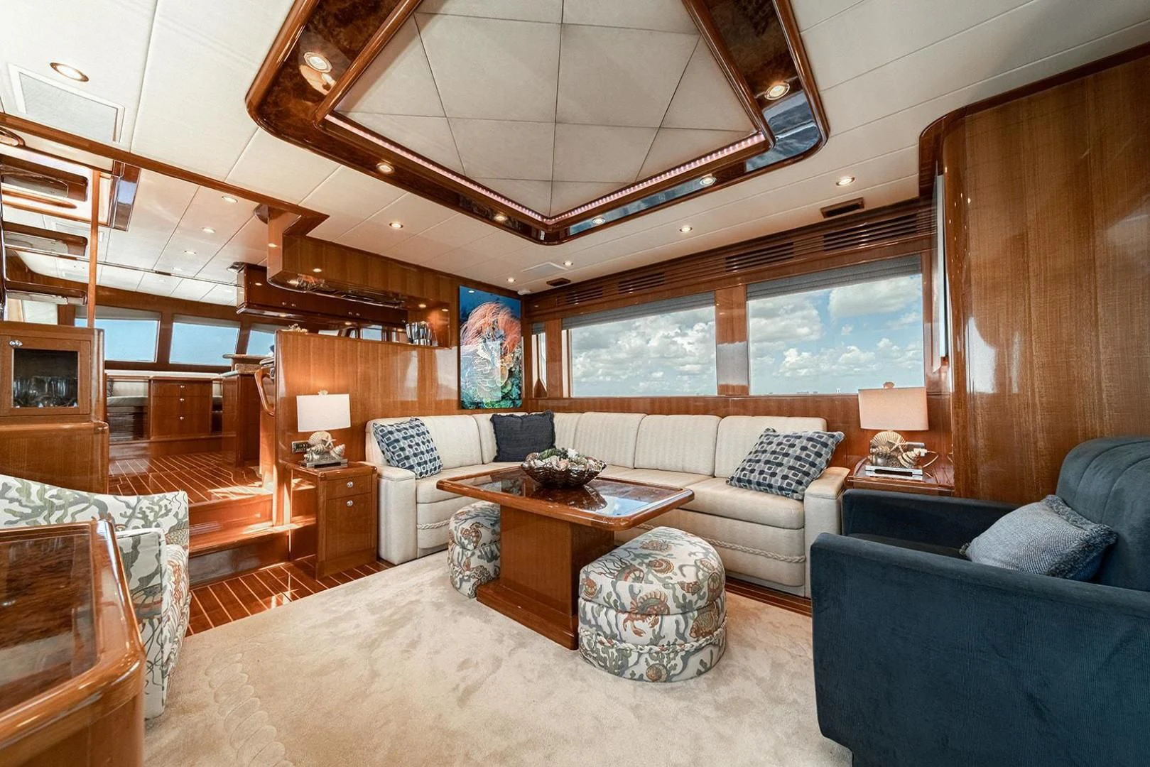 a living room with a large wood ceiling aboard DREAM CATCHER Yacht for Sale
