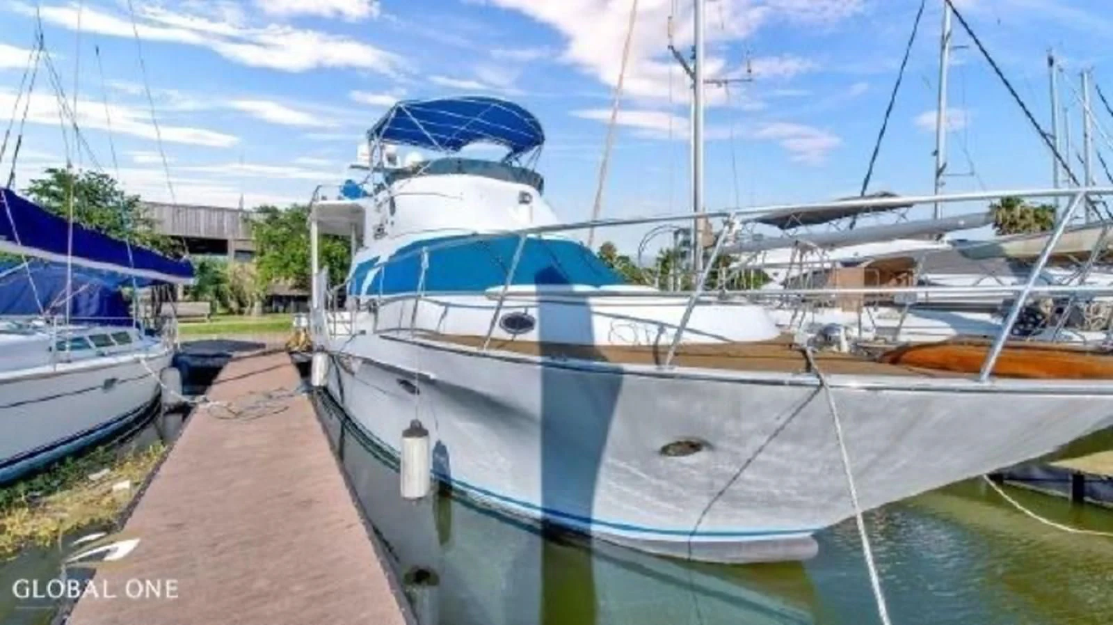a boat docked at a pier aboard DREAM CATCHER Yacht for Sale