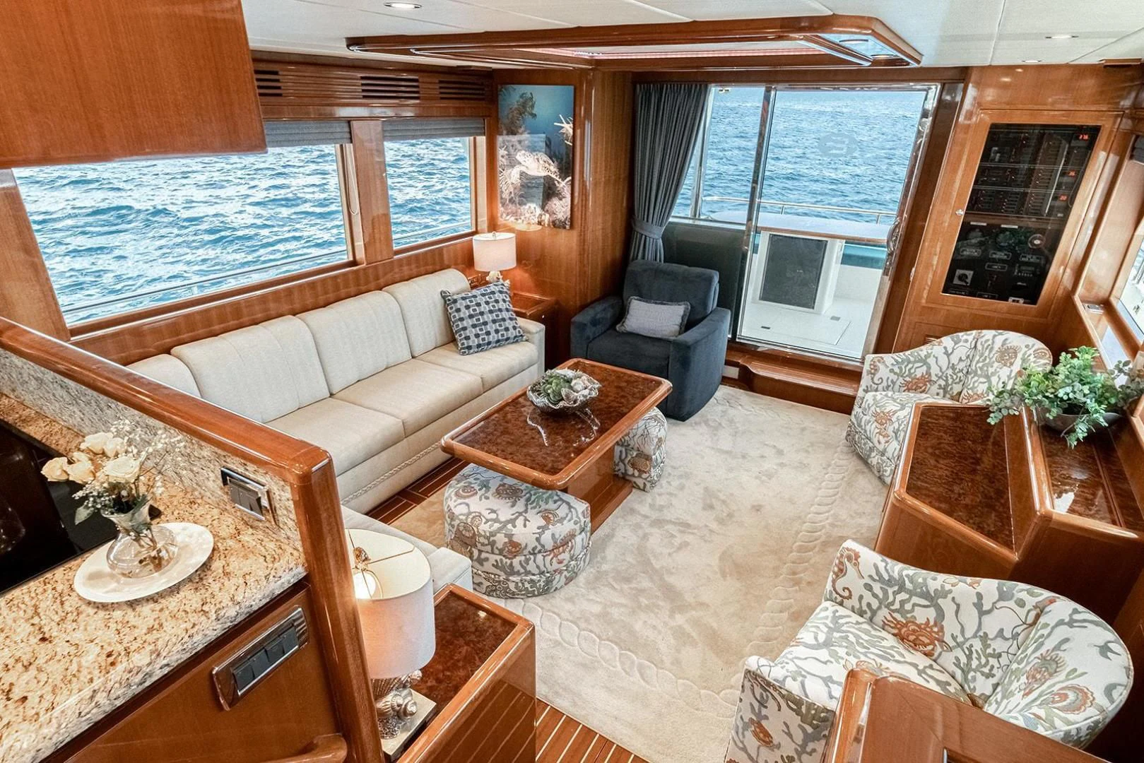a living room with a large window aboard DREAM CATCHER Yacht for Sale